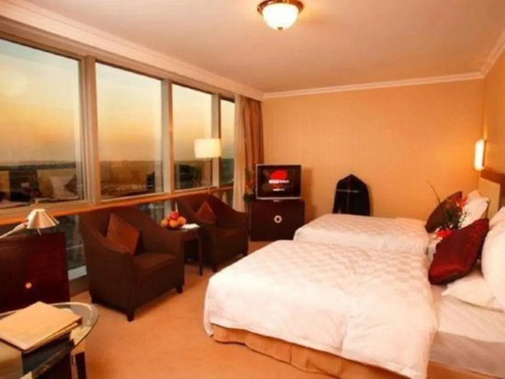 Bed in Beijing Jinjiang Fuyuan Hotel