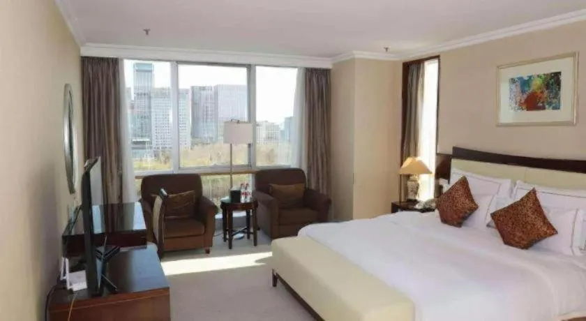 Bed in Beijing Jinjiang Fuyuan Hotel