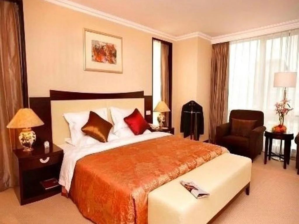 Bed in Beijing Jinjiang Fuyuan Hotel