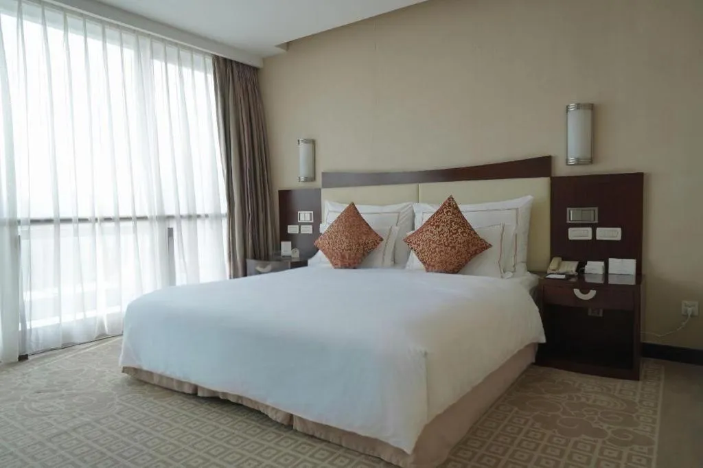 Bed in Beijing Jinjiang Fuyuan Hotel