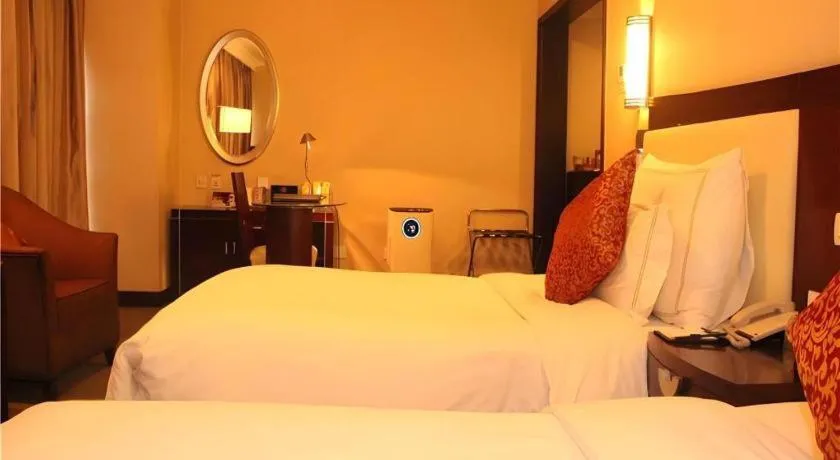 Bed in Beijing Jinjiang Fuyuan Hotel