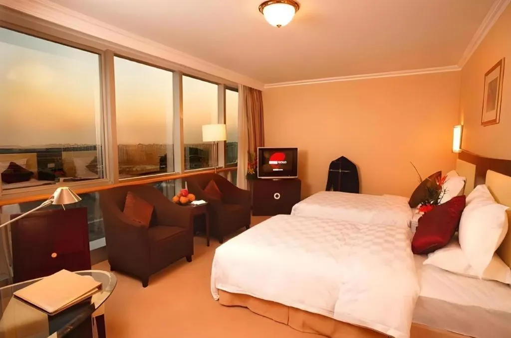 Bed in Beijing Jinjiang Fuyuan Hotel