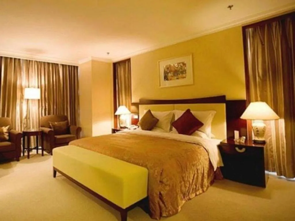 Bed in Beijing Jinjiang Fuyuan Hotel