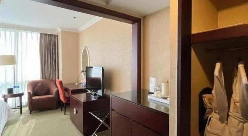 Bed in Beijing Jinjiang Fuyuan Hotel