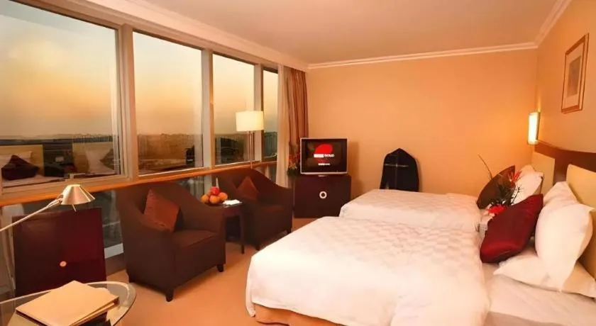 Bed in Beijing Jinjiang Fuyuan Hotel