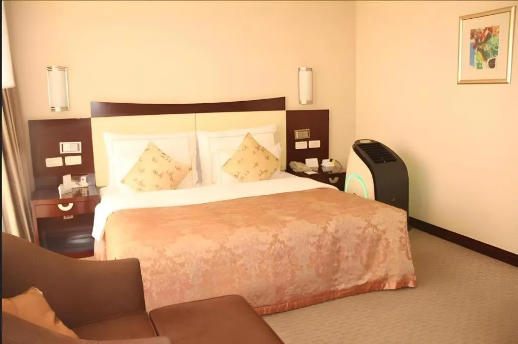 Bed in Beijing Jinjiang Fuyuan Hotel