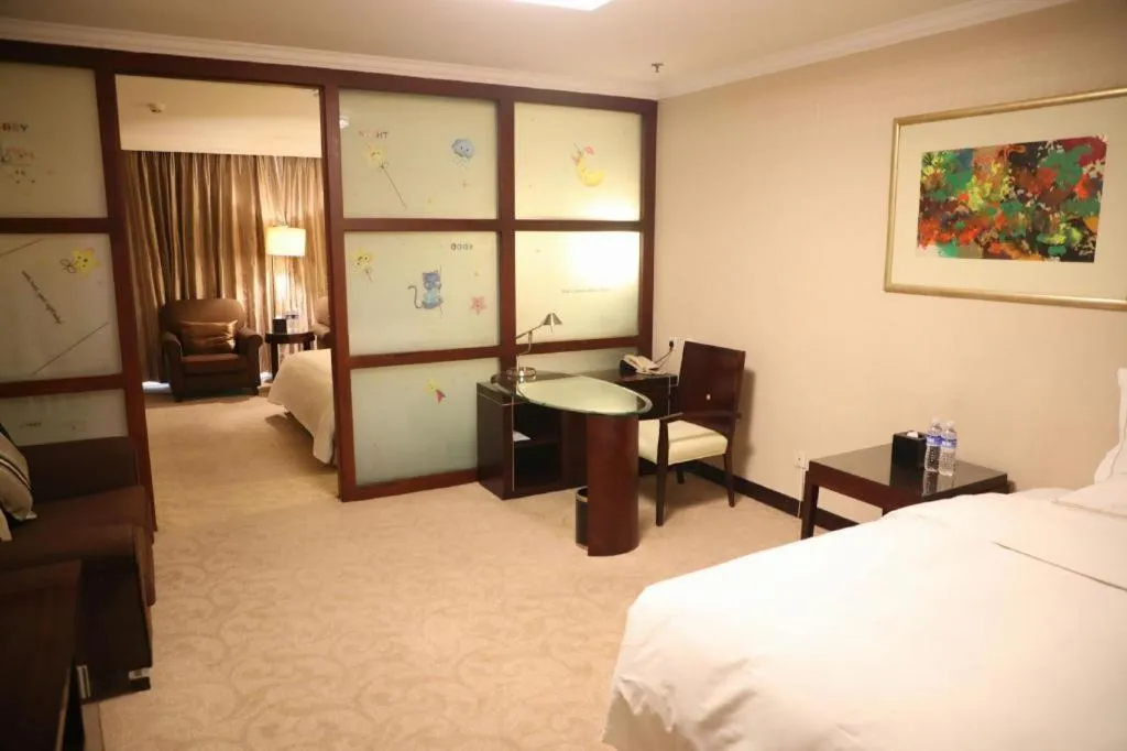 Bed in Beijing Jinjiang Fuyuan Hotel