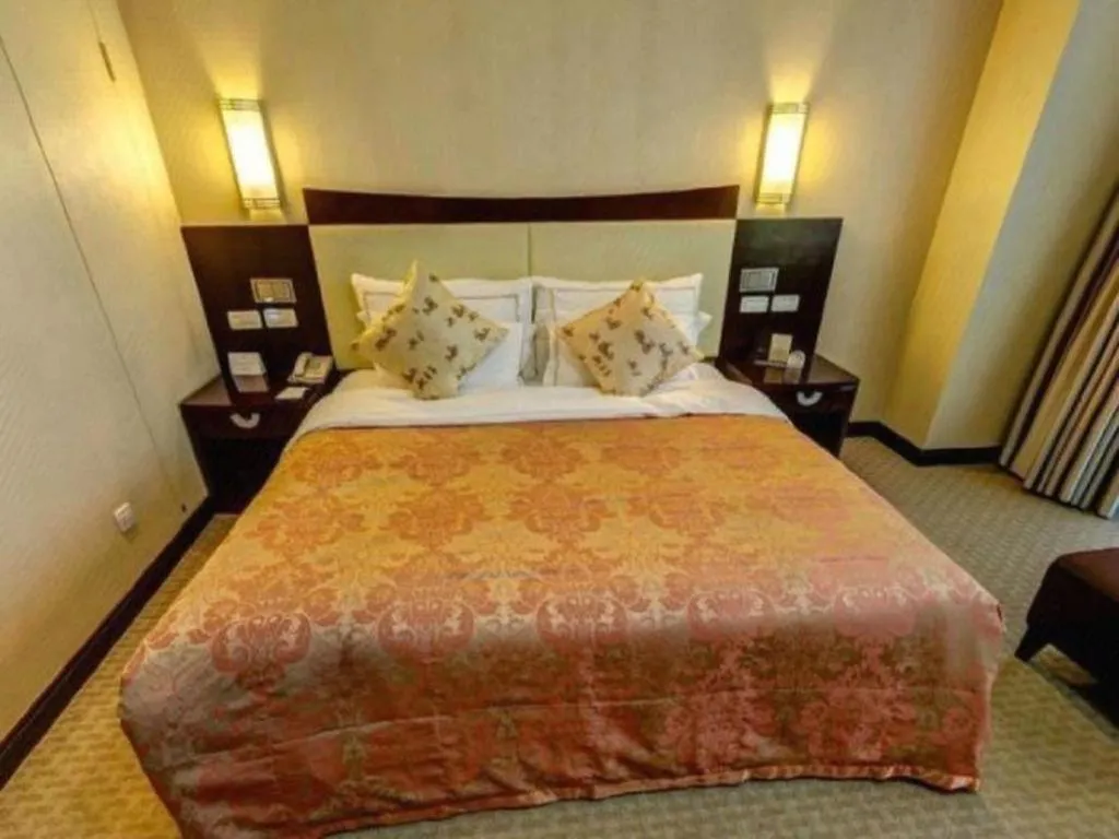 Bed in Beijing Jinjiang Fuyuan Hotel