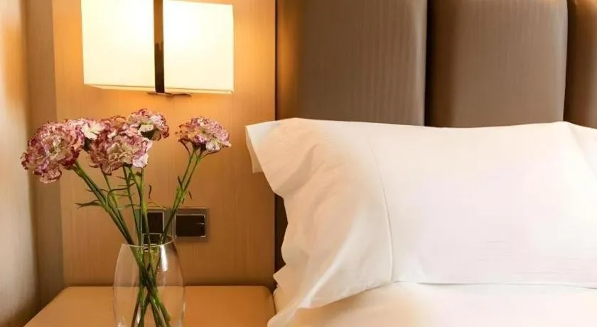 Bed in Beijing Jinjiang Fuyuan Hotel