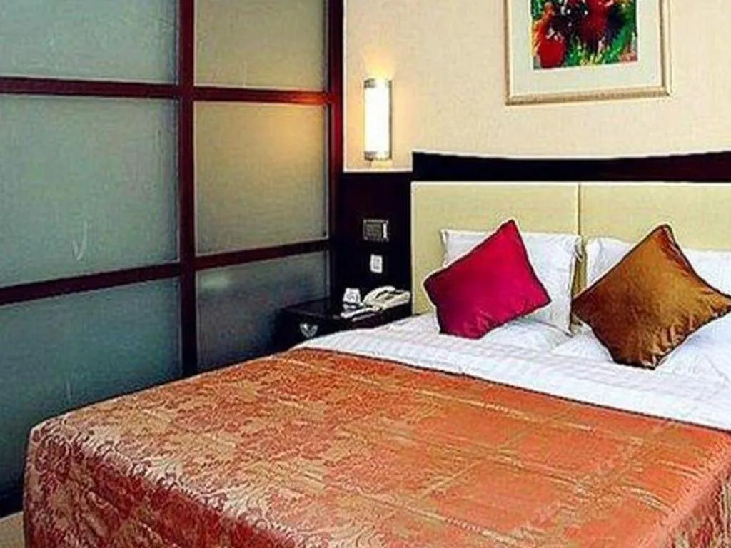 Bed in Beijing Jinjiang Fuyuan Hotel