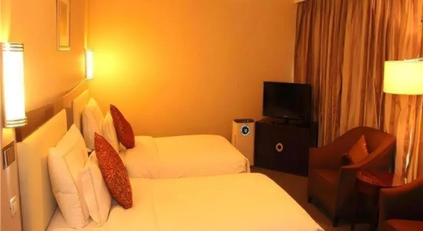 Bed in Beijing Jinjiang Fuyuan Hotel