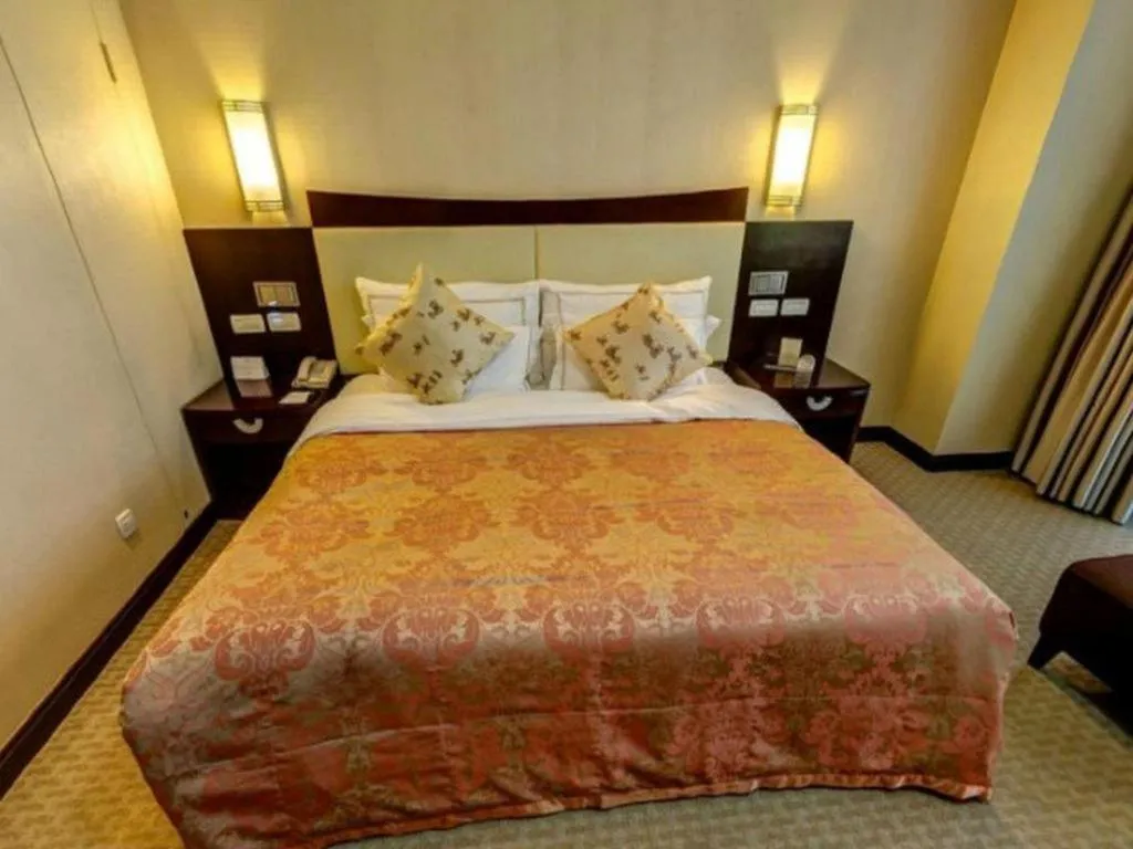 Bed in Beijing Jinjiang Fuyuan Hotel