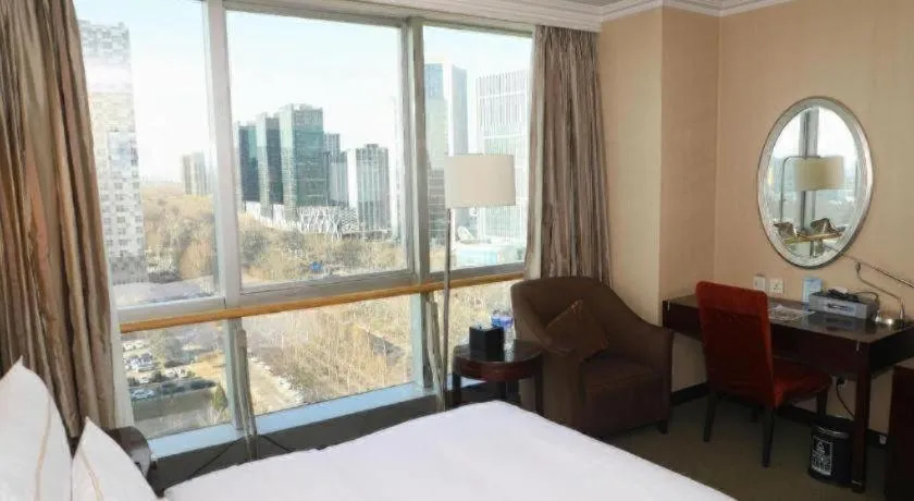 Bed in Beijing Jinjiang Fuyuan Hotel
