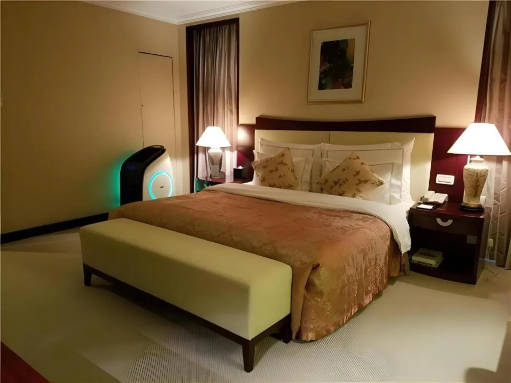 Bed in Beijing Jinjiang Fuyuan Hotel