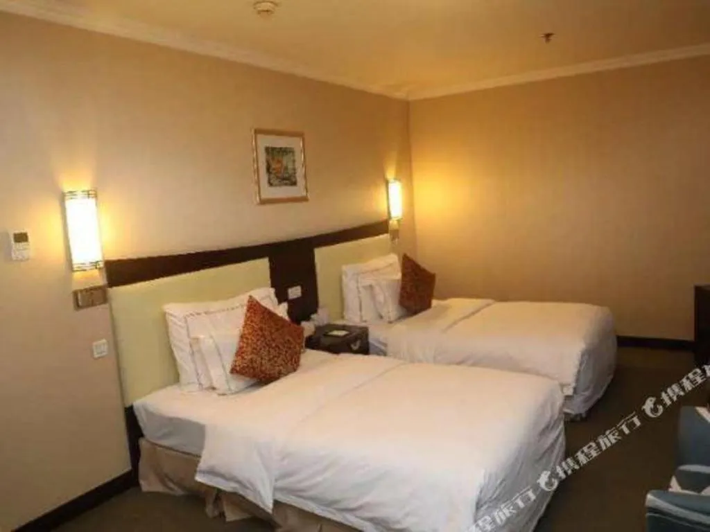 Bed in Beijing Jinjiang Fuyuan Hotel