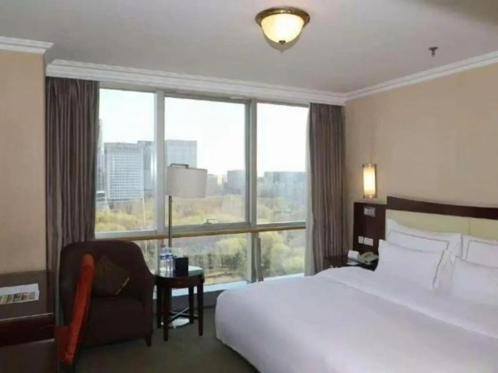 Bed in Beijing Jinjiang Fuyuan Hotel