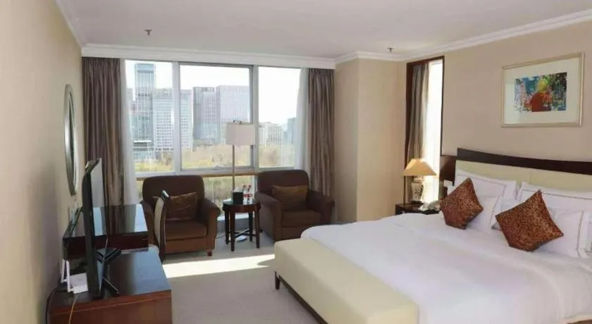 Bed in Beijing Jinjiang Fuyuan Hotel