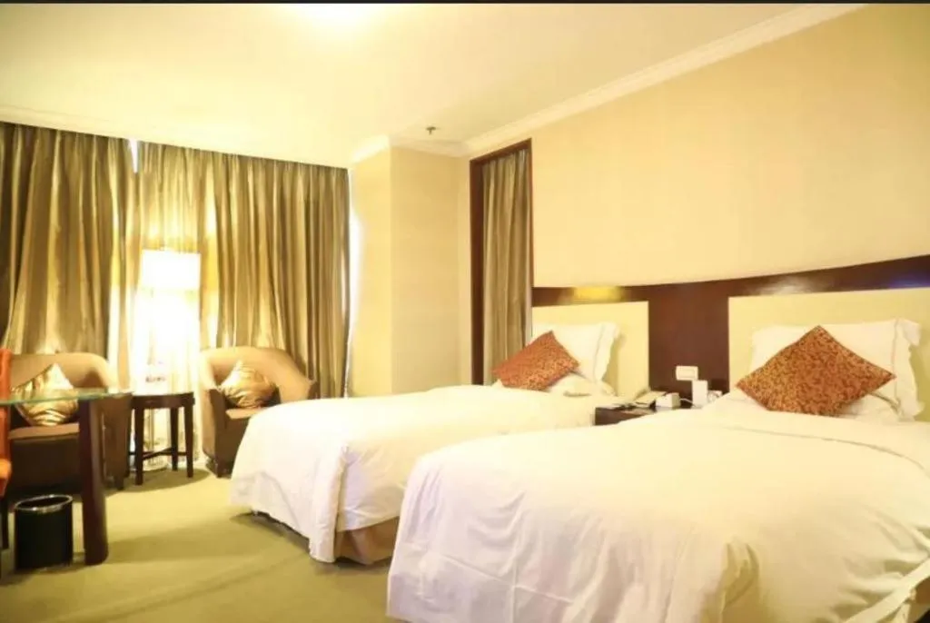 Bed in Beijing Jinjiang Fuyuan Hotel