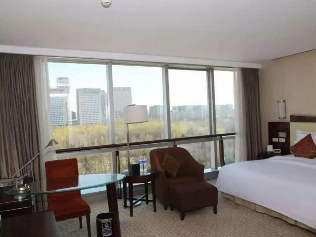 Bed in Beijing Jinjiang Fuyuan Hotel