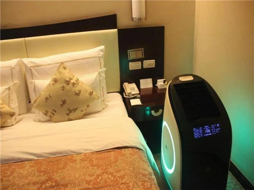 Bed in Beijing Jinjiang Fuyuan Hotel