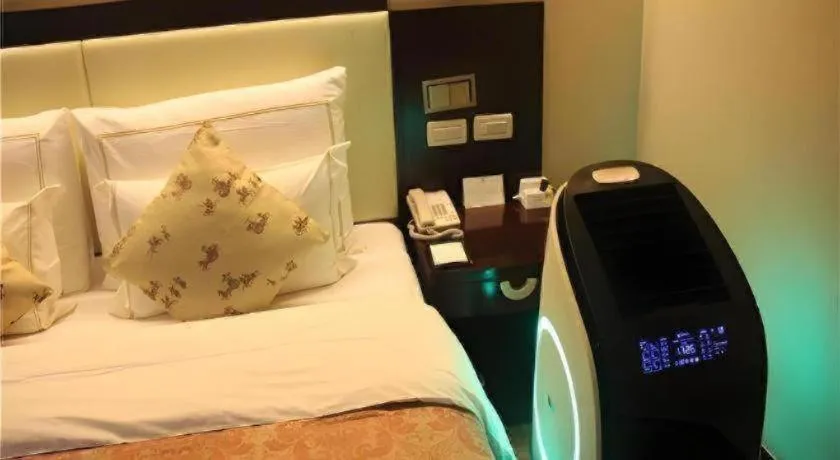 Bed in Beijing Jinjiang Fuyuan Hotel