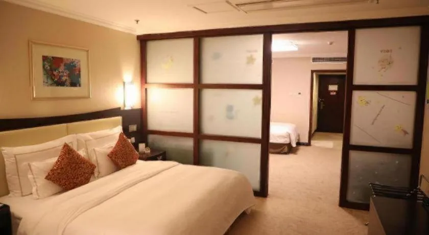 Bed in Beijing Jinjiang Fuyuan Hotel