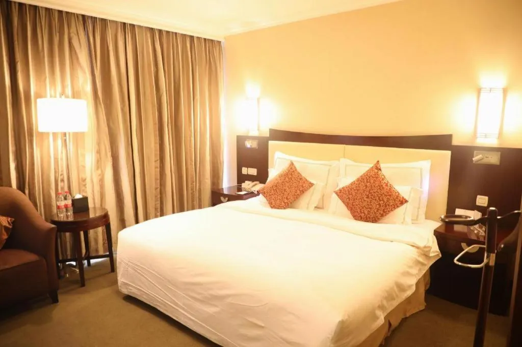 Bed in Beijing Jinjiang Fuyuan Hotel