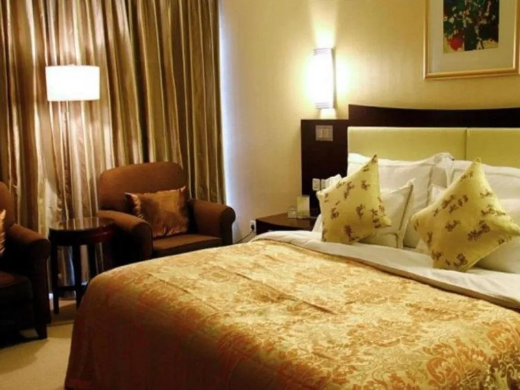 Bed in Beijing Jinjiang Fuyuan Hotel