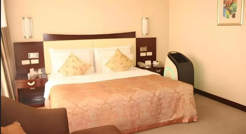 Bed in Beijing Jinjiang Fuyuan Hotel