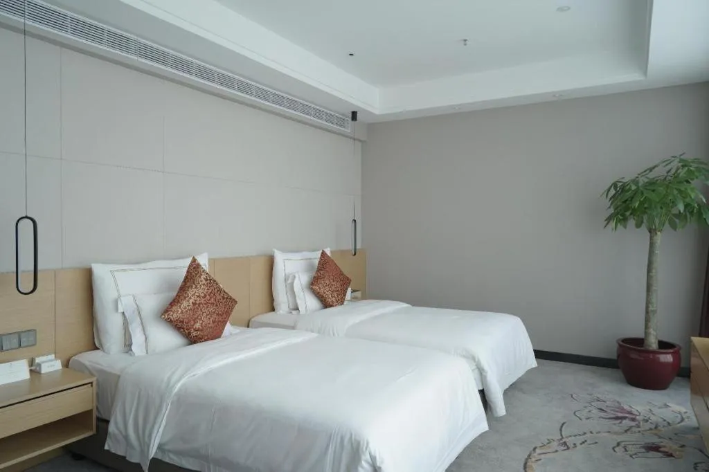 Bed in Beijing Jinjiang Fuyuan Hotel