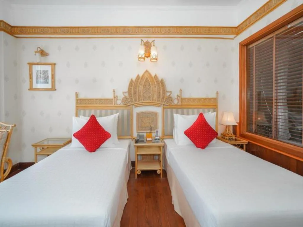 Bed in Senriver Hotel