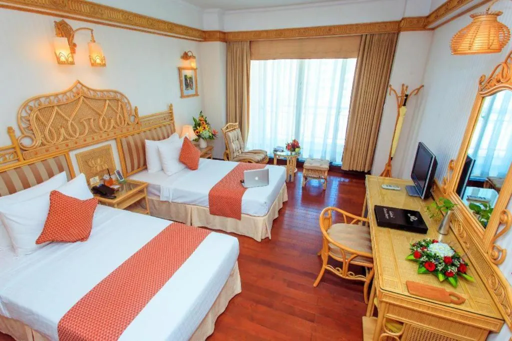 Bed in Senriver Hotel