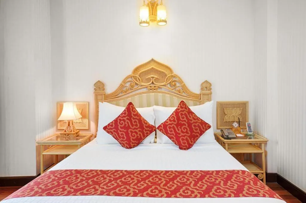 Bed in Senriver Hotel