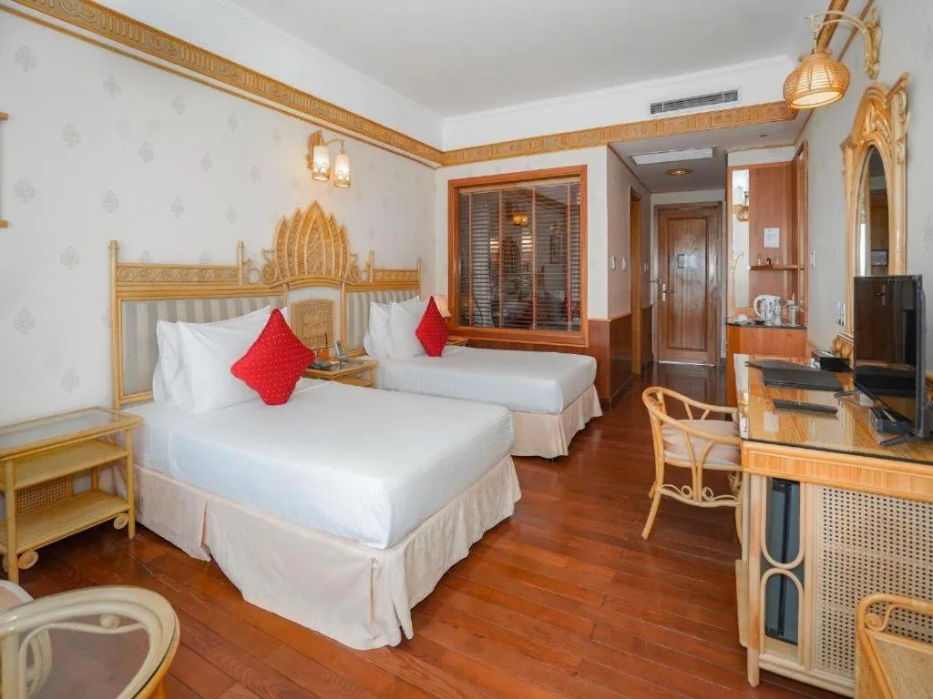 Bed in Senriver Hotel