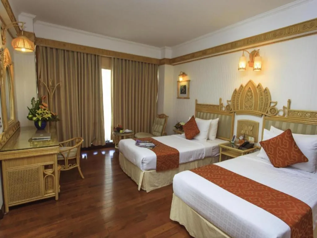 Bed in Senriver Hotel