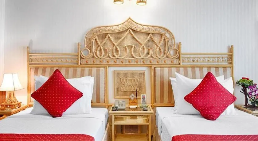 Bed in Senriver Hotel