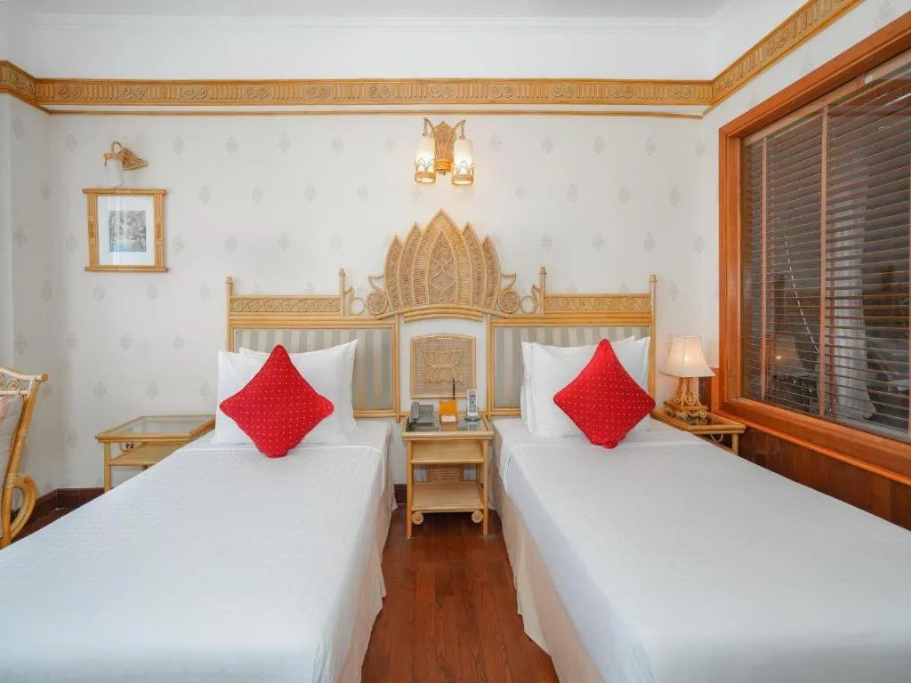 Bed in Senriver Hotel