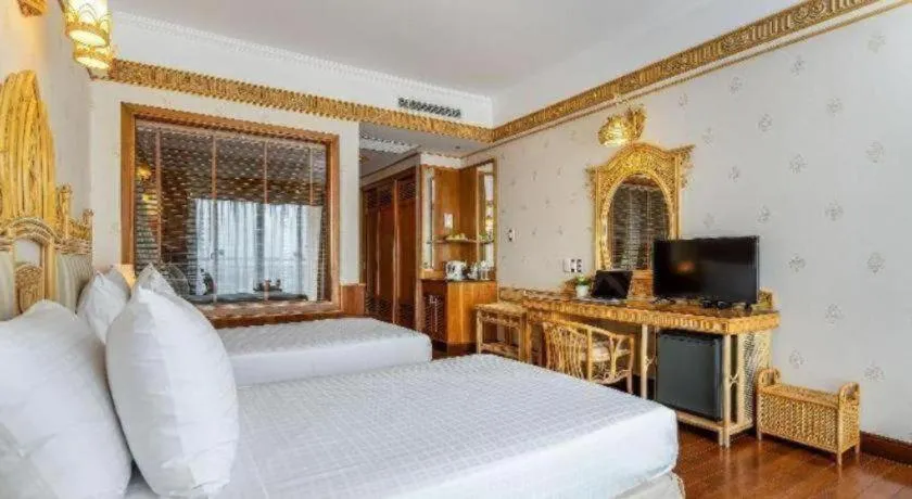 Bed in Senriver Hotel