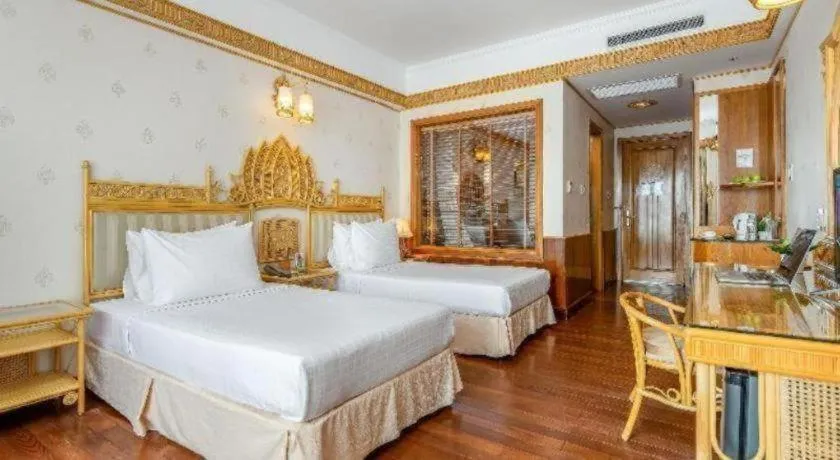 Bed in Senriver Hotel