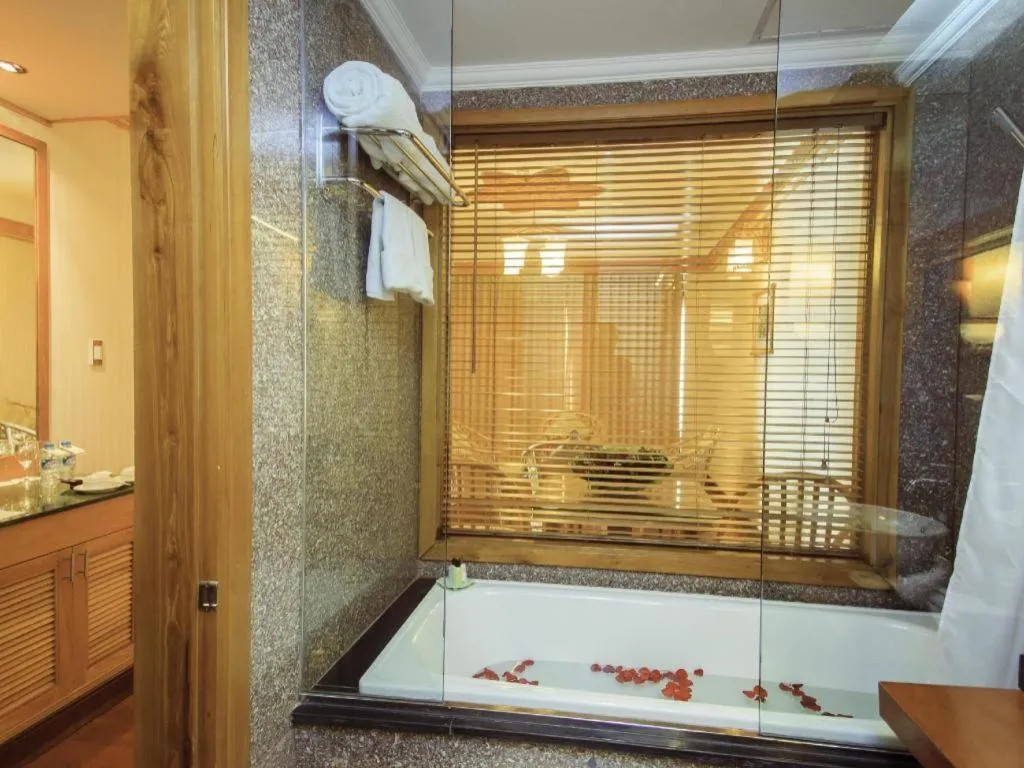 Bed in Senriver Hotel