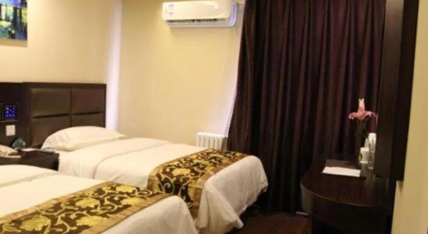 Bed in GreenTree Alliance Beijing Tiantan DonGMEn Hotel