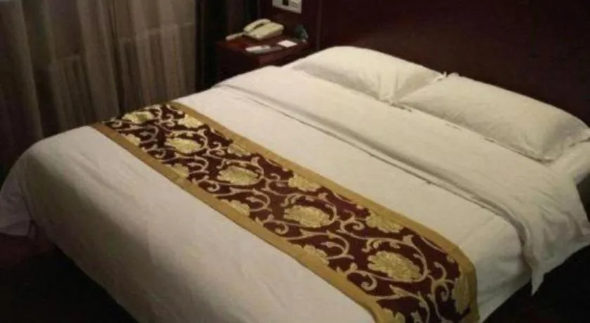 Bed in GreenTree Alliance Beijing Tiantan DonGMEn Hotel