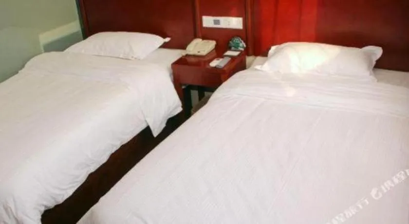 Bed in GreenTree Alliance Beijing Tiantan DonGMEn Hotel