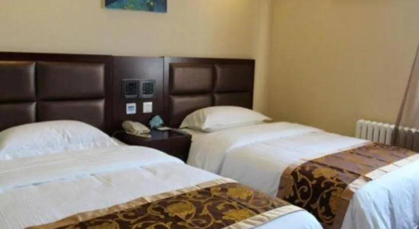 Bed in GreenTree Alliance Beijing Tiantan DonGMEn Hotel