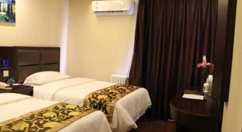 Bed in GreenTree Alliance Beijing Tiantan DonGMEn Hotel