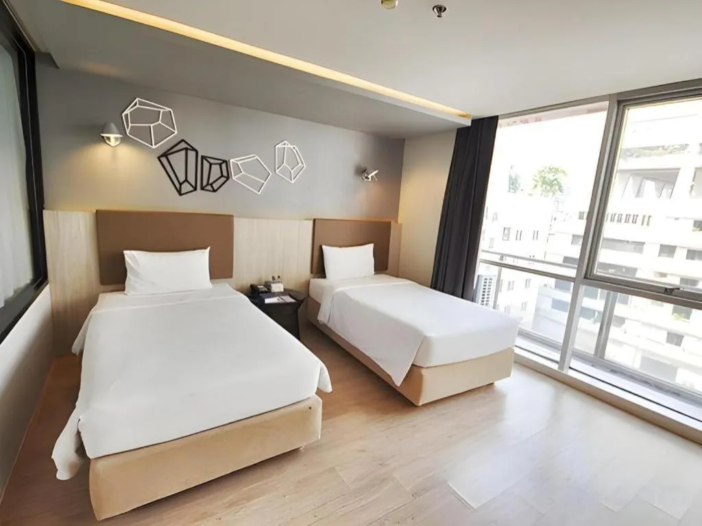 Bed in The Heritage Silom Hotel