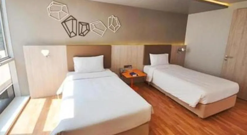 Bed in The Heritage Silom Hotel