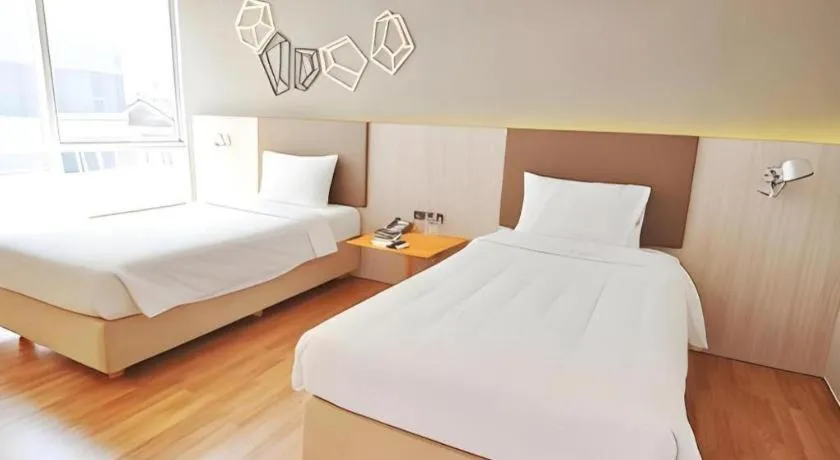 Bed in The Heritage Silom Hotel