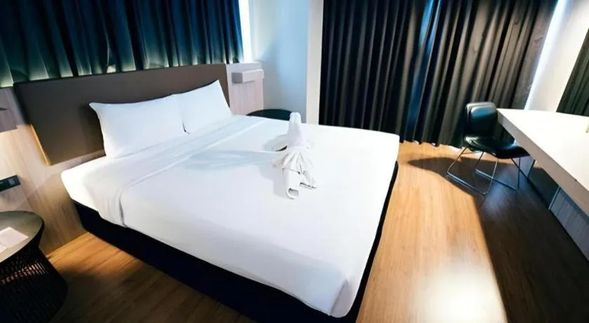 Bed in The Heritage Silom Hotel