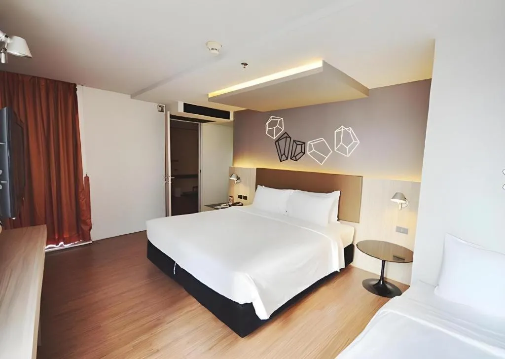 Bed in The Heritage Silom Hotel